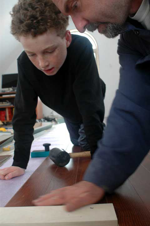 steve_maxwell_installs_laminate_flooring_with_son