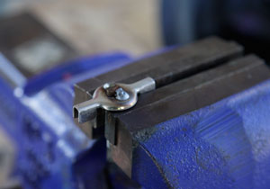 steve maxwell repairs a broken breadmaker using a wire-feed welder