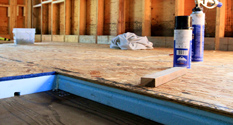 insulation installed in bedroom above unheated garage