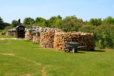 stacking firewood piles