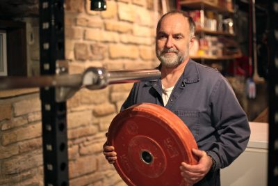 Steve Maxwell with weight plate